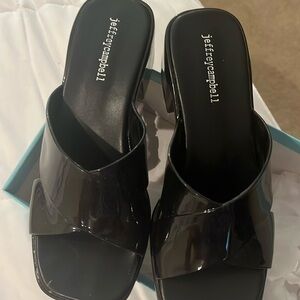 Black patent leather slip ons